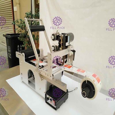 Máy dán nhãn chai tròn dính Máy dán nhãn chai bán tự động