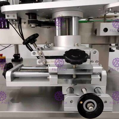 Máy dán nhãn chai tròn tự dính