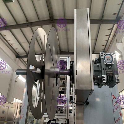 Máy chiết rót chai tự động hoàn toàn với hệ thống dán nhãn hai đầu